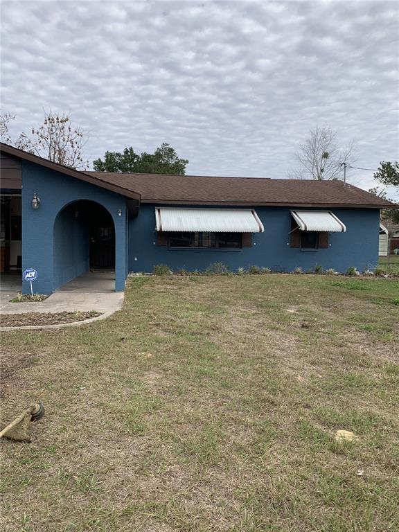5140 Courtland Road Spring Hill, FL 34608 - Photo 2 of 20 a view of a lake with a swimming pool