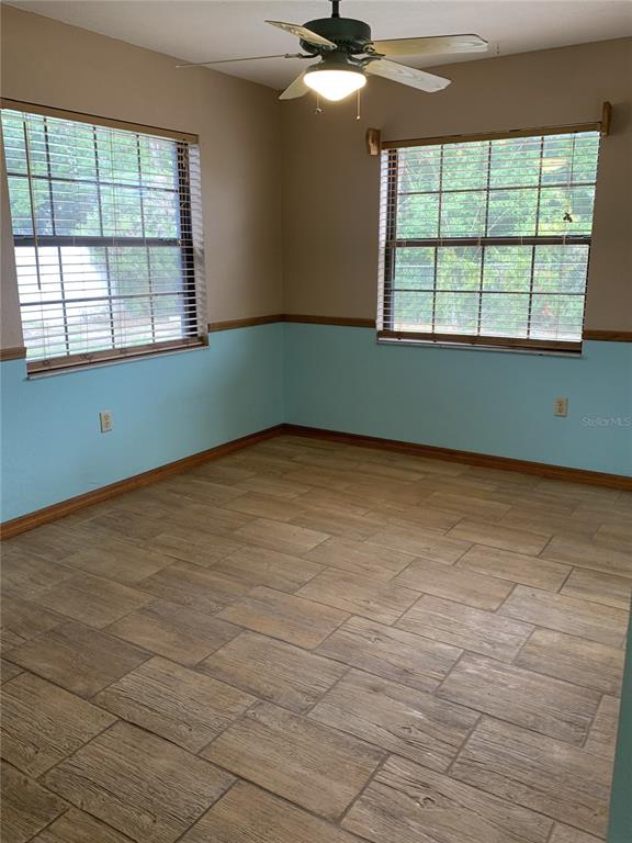 5140 Courtland Road Spring Hill, FL 34608 - Photo 10 of 20 an empty room with a window