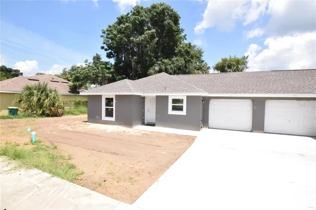 a house with trees in the background