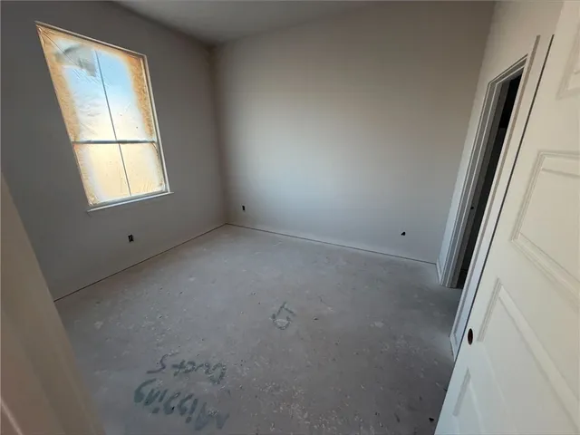an empty room with closet