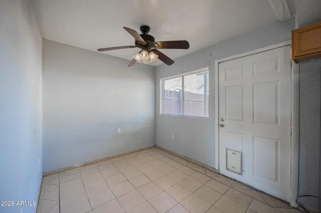 a view of an empty room and window