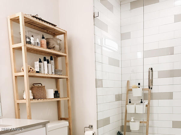 1130 North 2nd Street, Unit 306 Phoenix, AZ 85004 - Photo 11 of 19 a bathroom with a bathtub and a shower