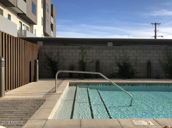 1130 North 2nd Street, Unit 306 Phoenix, AZ 85004 - Photo 14 of 19 a view of backyard with wooden floor and fence