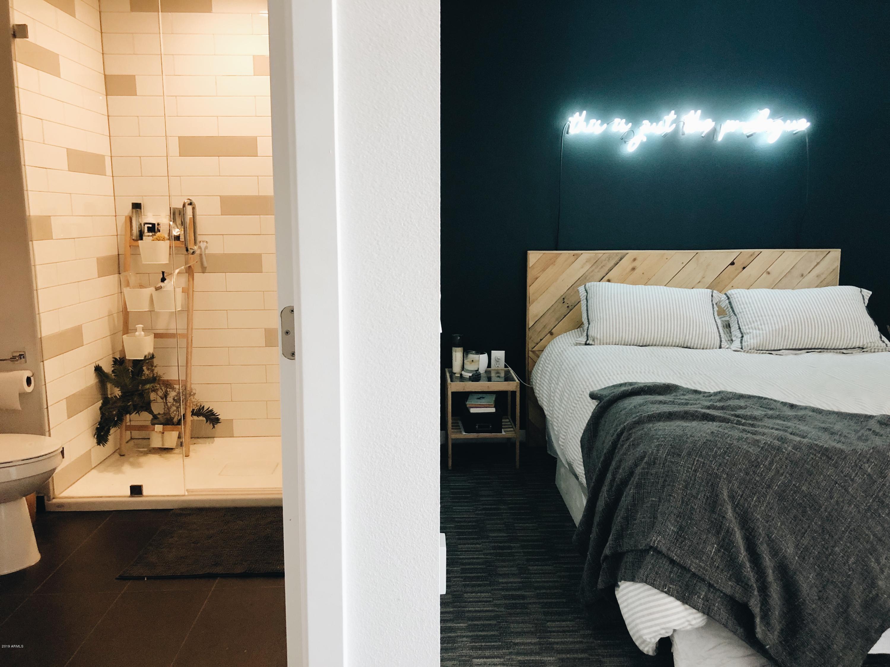 1130 North 2nd Street, Unit 306 Phoenix, AZ 85004 - Photo 6 of 19 a en suite bathroom with a sink and a mirror