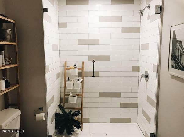 1130 North 2nd Street, Unit 306 Phoenix, AZ 85004 - Photo 8 of 19 a bathroom with a shower