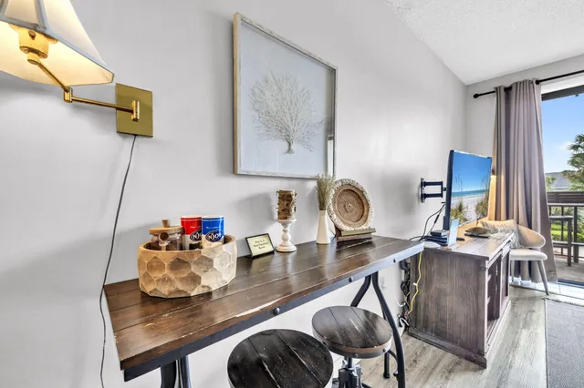 a bedroom with bed and a couch