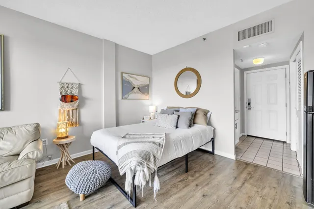 a view of kitchen with cabinets and stove