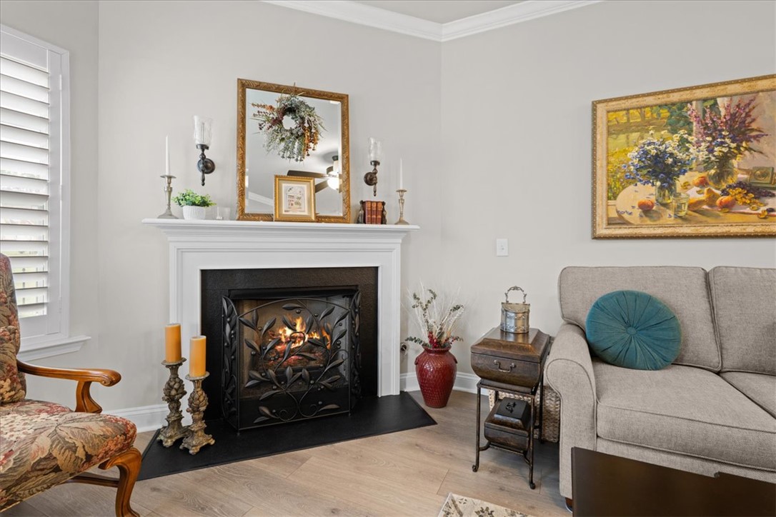 119 Shipyard Circle Anderson, SC 29621 - Photo 8 of 50 A refined fireplace with a classic mantel anchors this inviting living space.