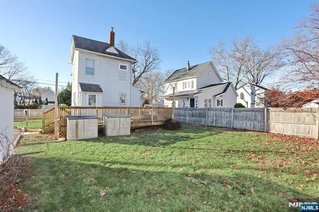 a view of a back yard of the house