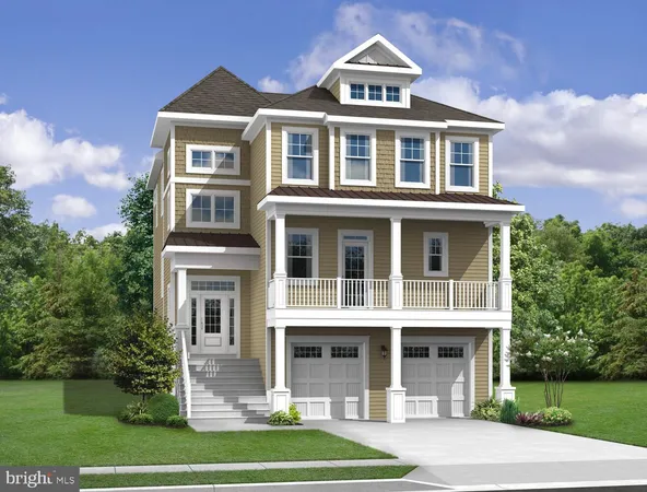 a front view of a residential apartment building with a yard