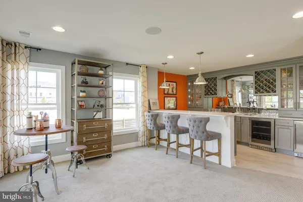 a kitchen with counter top space cabinets and stainless steel appliances