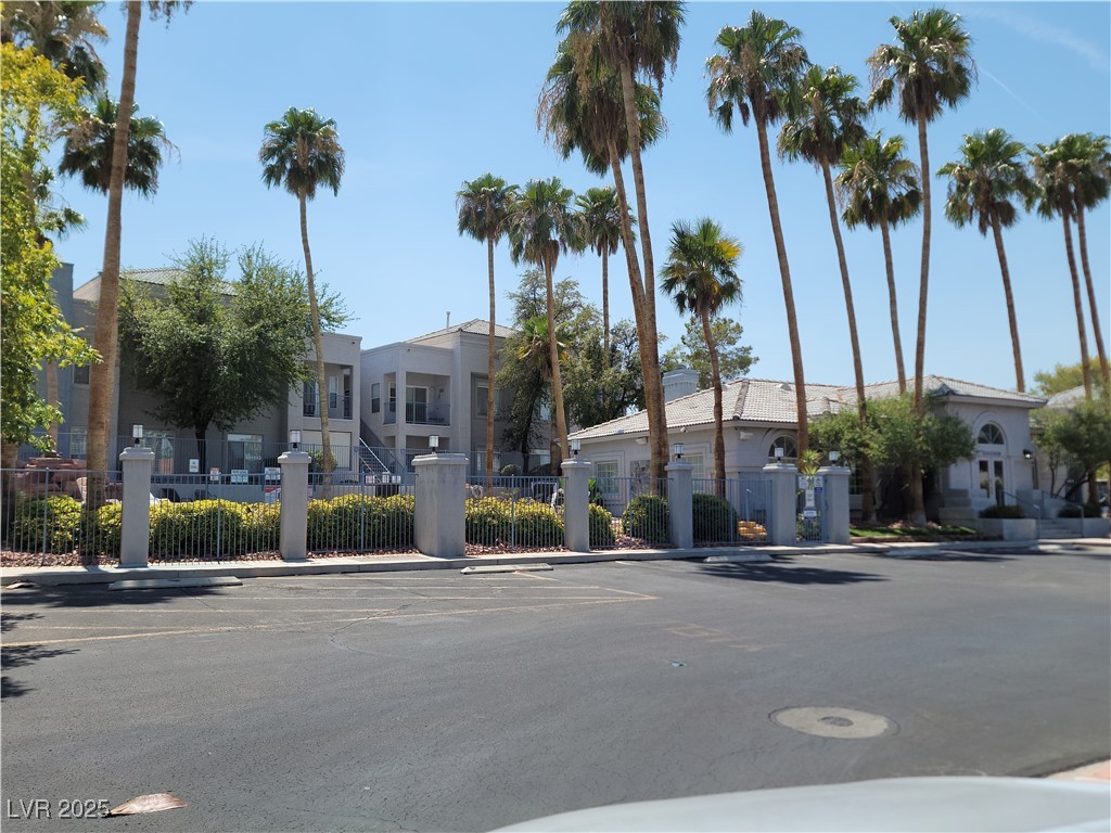 2201 Ramsgate Drive, Unit 923 Henderson, NV 89074 - Photo 23 of 28 View of property featuring uncovered parking and a residential view
