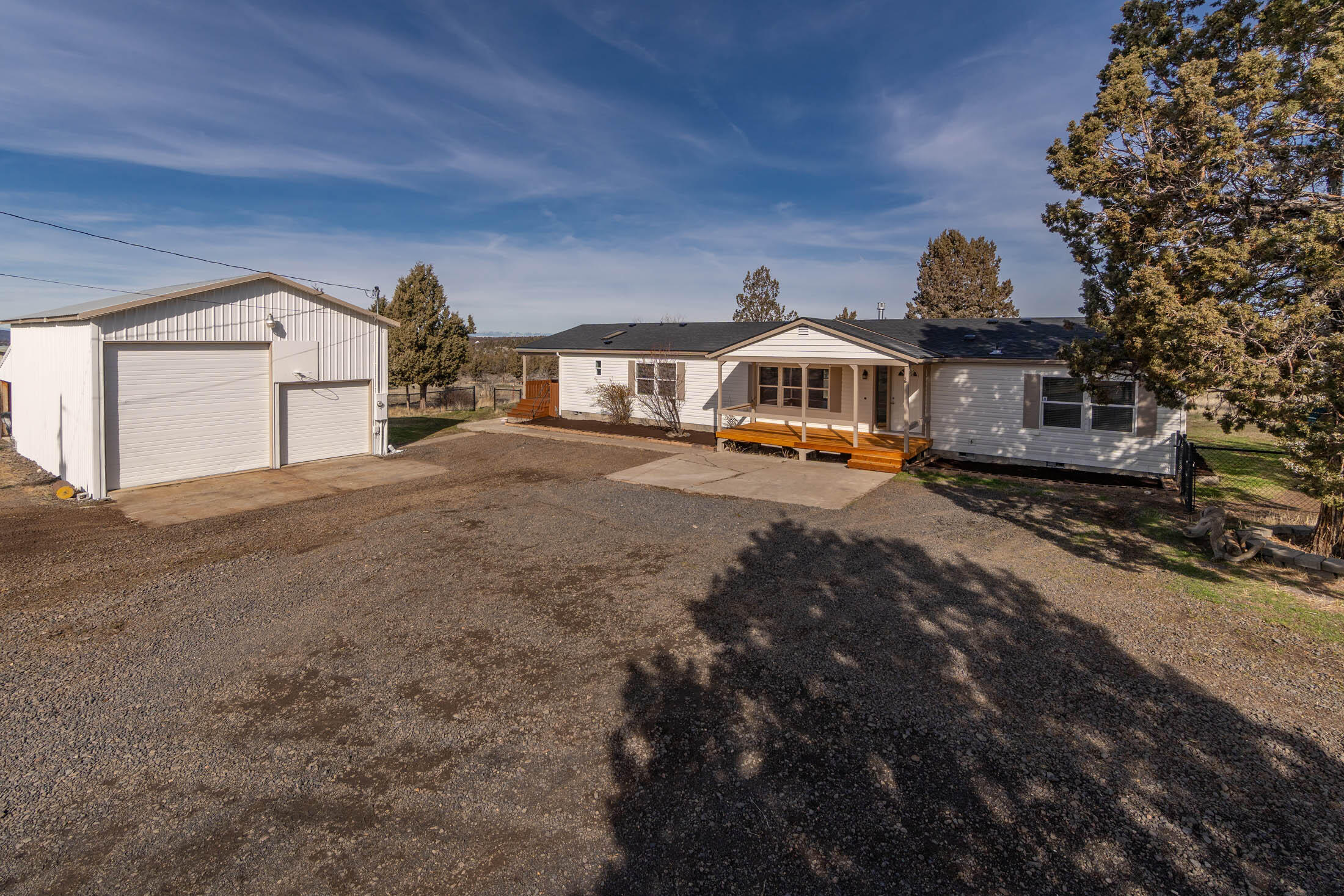 10113 Ridgeview Road Prineville, OR 97754 - Photo 16 of 31 a front view of a house with a yard