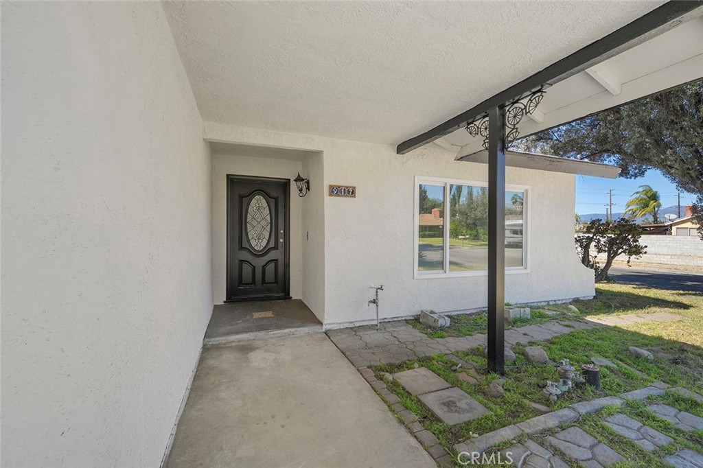 917 Renee Street Redlands, CA 92374 - Photo 3 of 26 Spacious covered front for guests to be greeted and protected from the elements whether rain or shine.