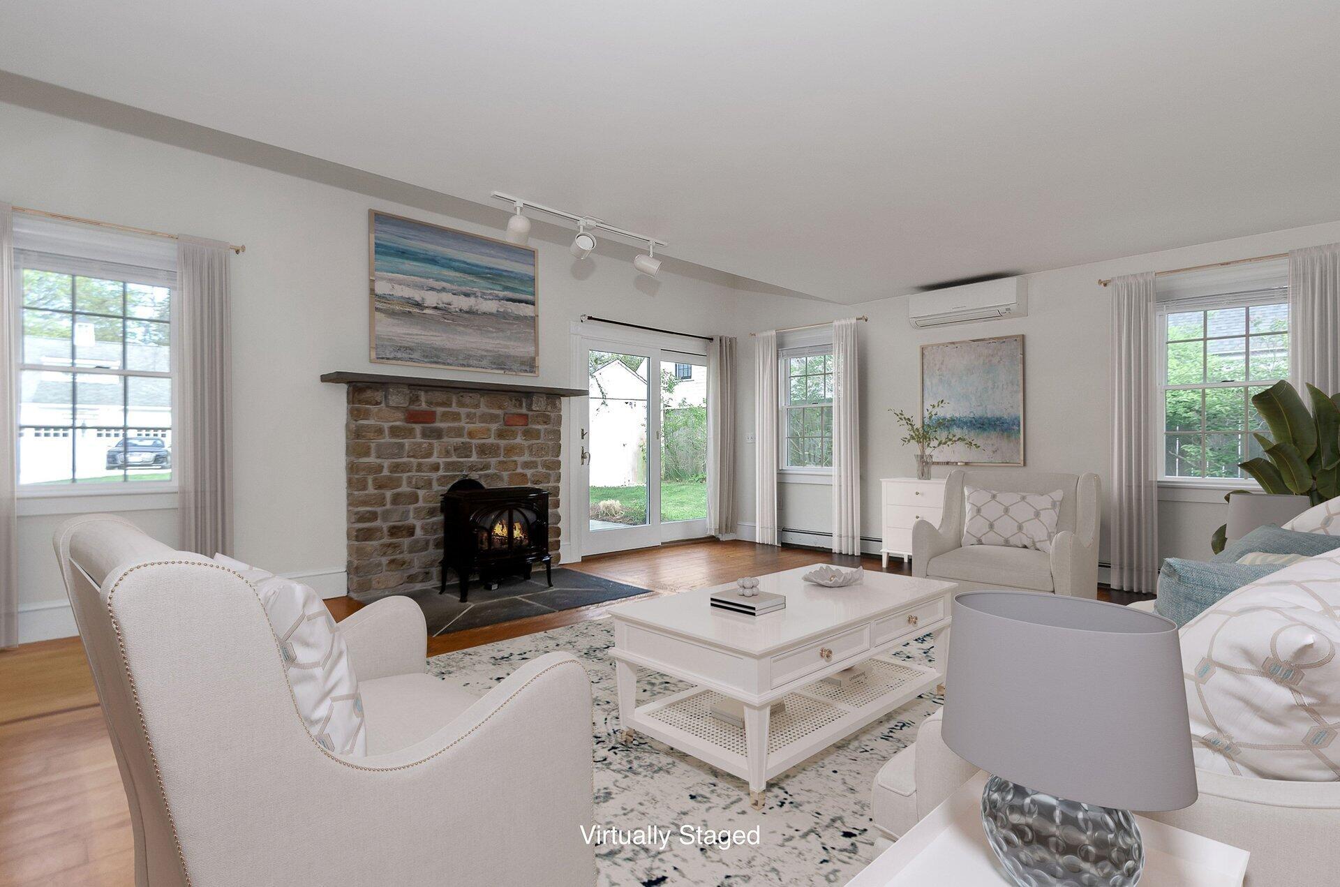 1089 Main Street Cotuit, MA 02635 - Photo 14 of 41 a living room with furniture fireplace and window