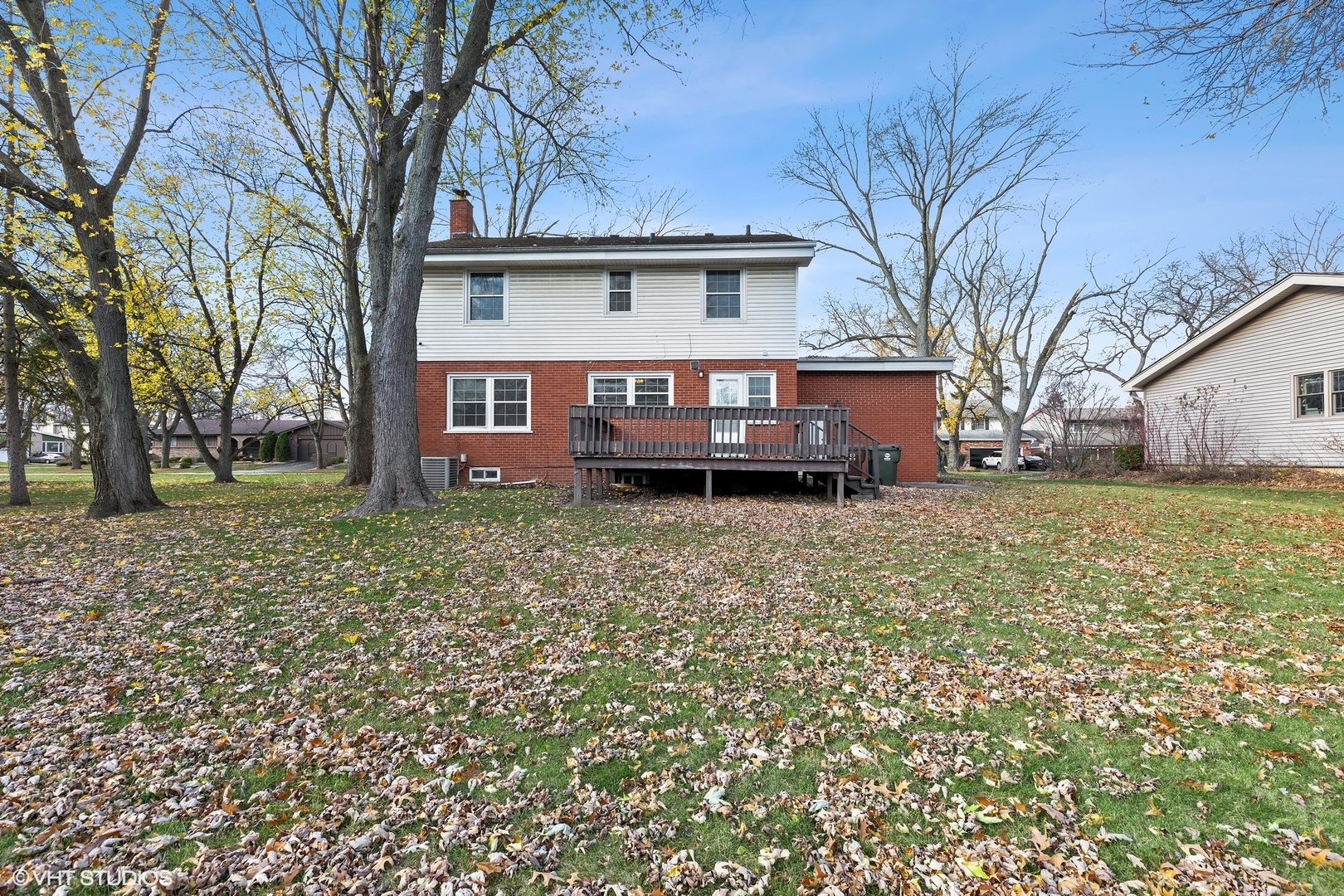939 Maple Road Flossmoor, IL 60422 - Photo 18 of 23 a front view of a house with a yard