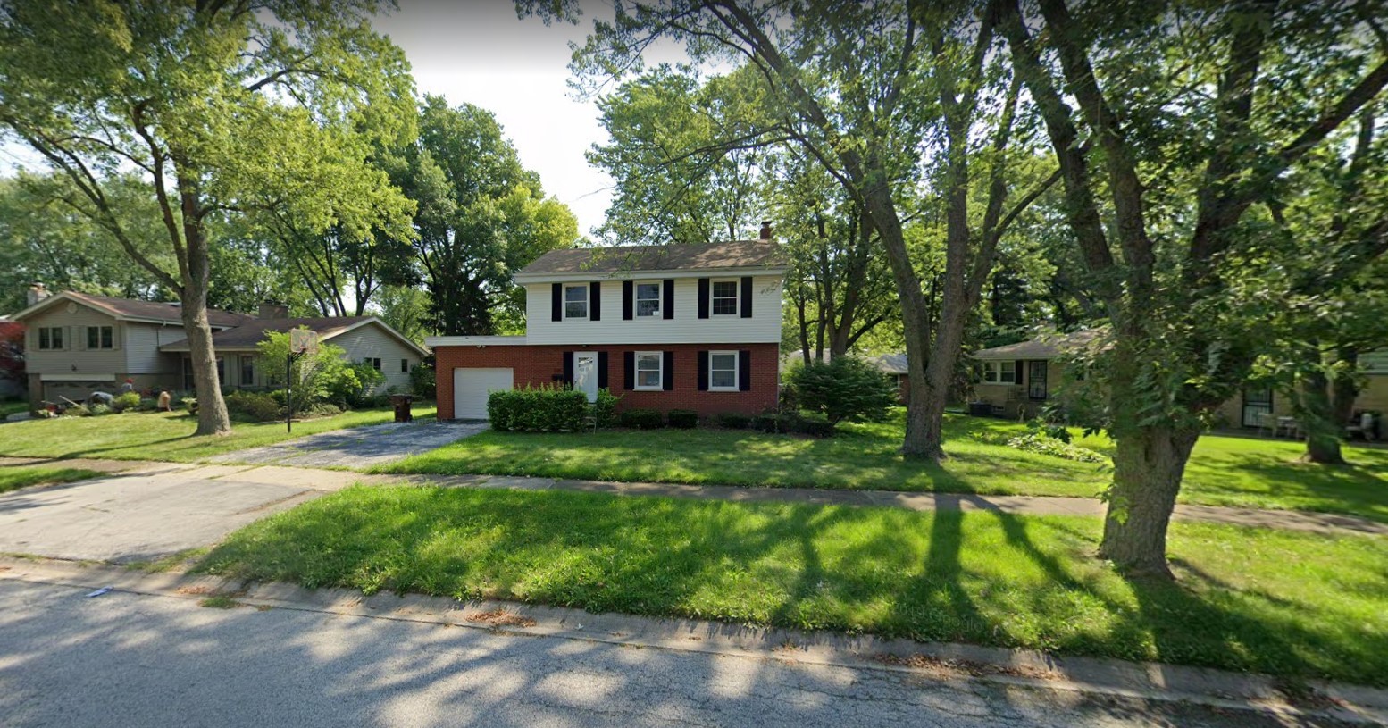 939 Maple Road Flossmoor, IL 60422 - Photo 19 of 23 a view of a house with a yard