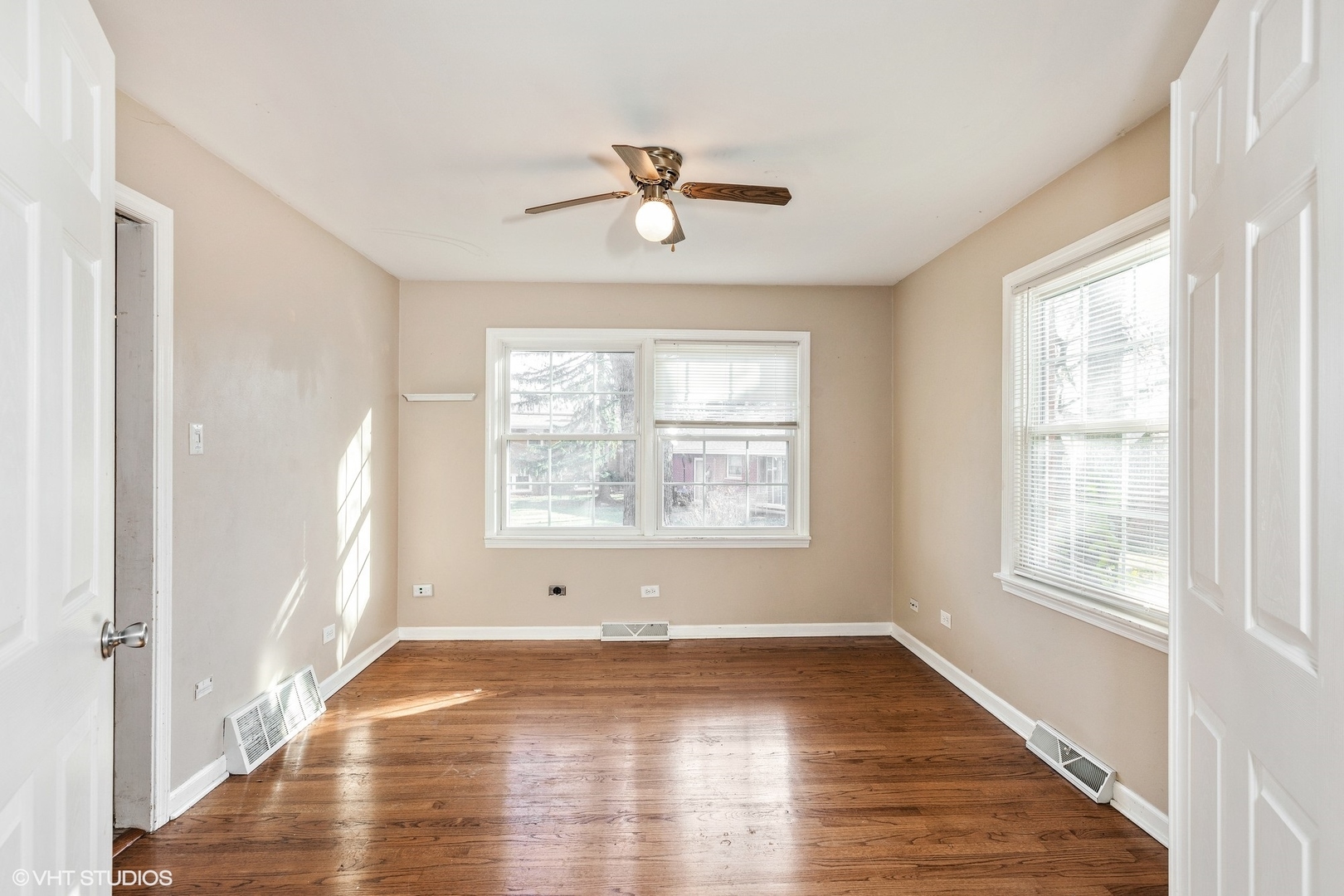 939 Maple Road Flossmoor, IL 60422 - Photo 7 of 23 a view of empty room with wooden floor and fan