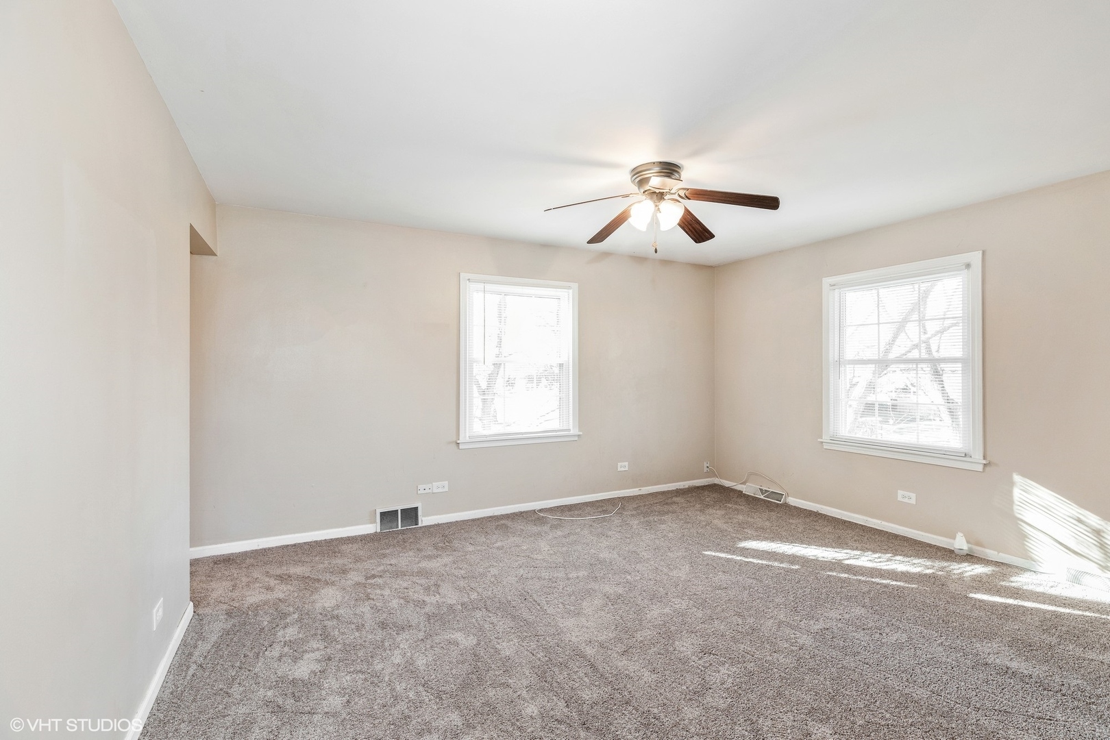 939 Maple Road Flossmoor, IL 60422 - Photo 9 of 23 wooden floor in an empty room with a window