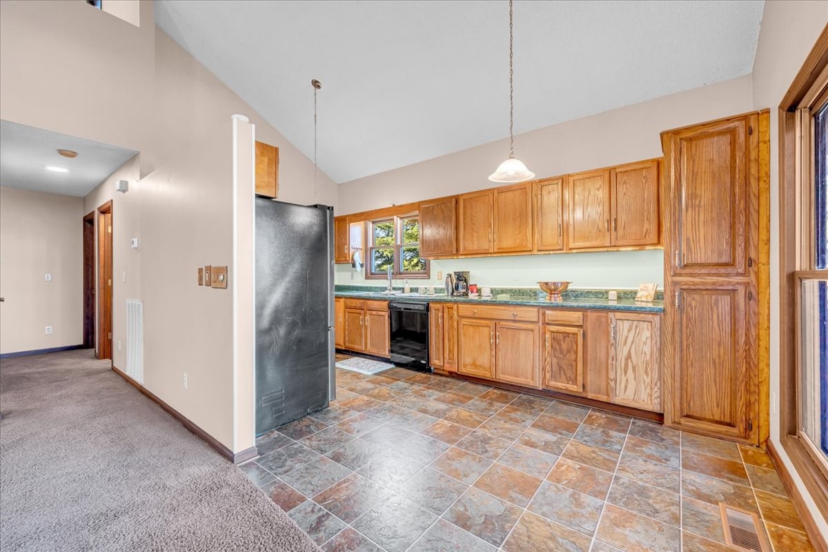 137 J D Ring Road Hillsboro, TN 37342 - Photo 14 of 49 a kitchen with stainless steel appliances granite countertop a refrigerator and a sink