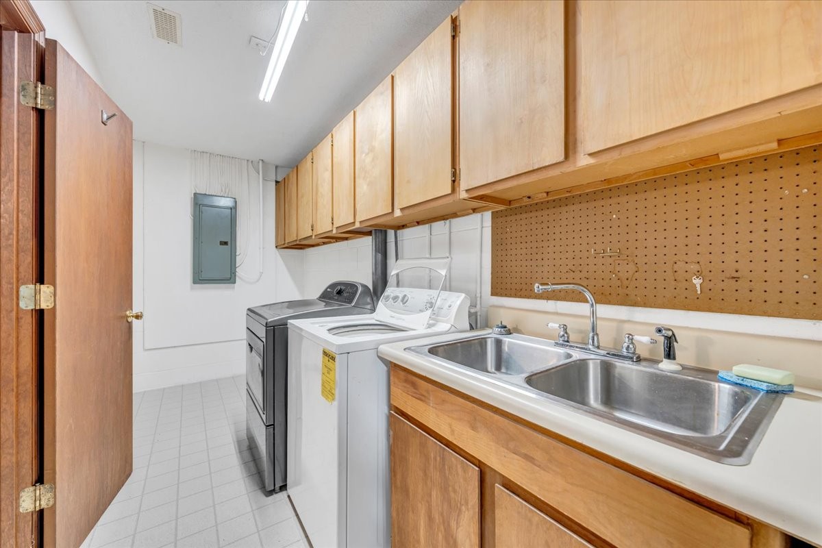 137 J D Ring Road Hillsboro, TN 37342 - Photo 32 of 49 a kitchen that has a sink and a stove