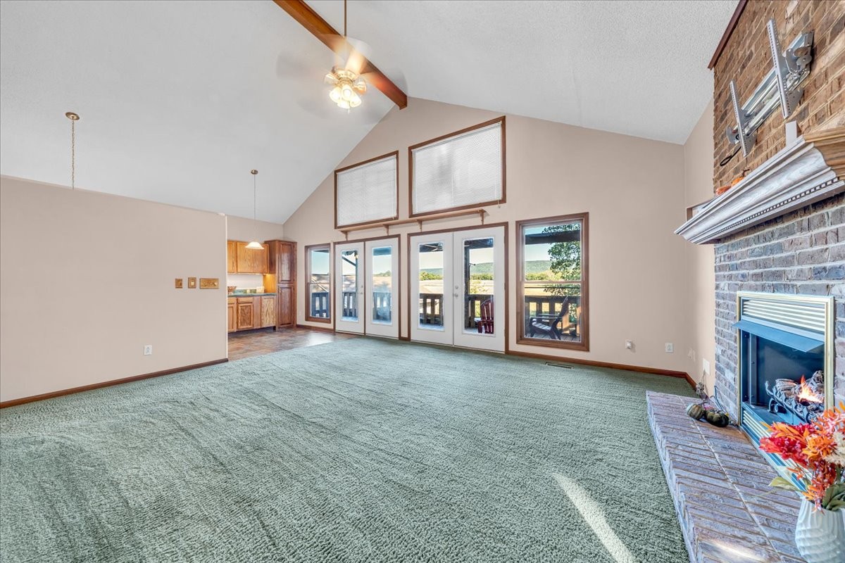 137 J D Ring Road Hillsboro, TN 37342 - Photo 7 of 49 a view of an empty room with window and fireplace