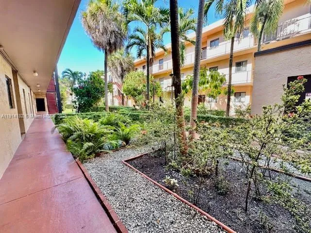 a view of a garden with pathway