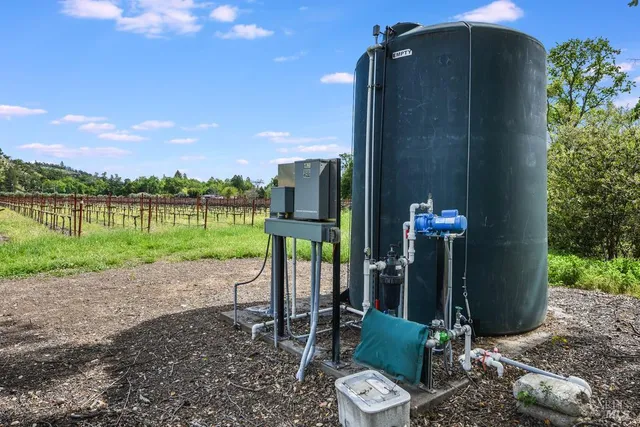 a view of a porch with a table and a chairs
