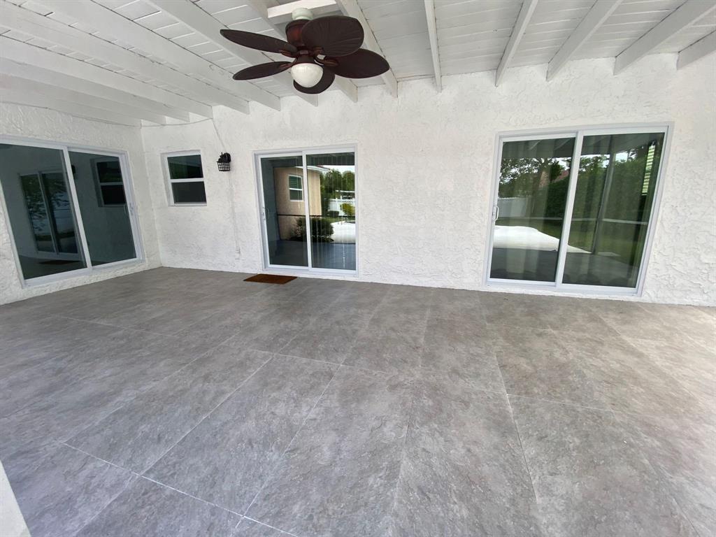 3980 Northwest 109th Avenue Coral Springs, FL 33065 - Photo 11 of 12 a view of an empty room with windows