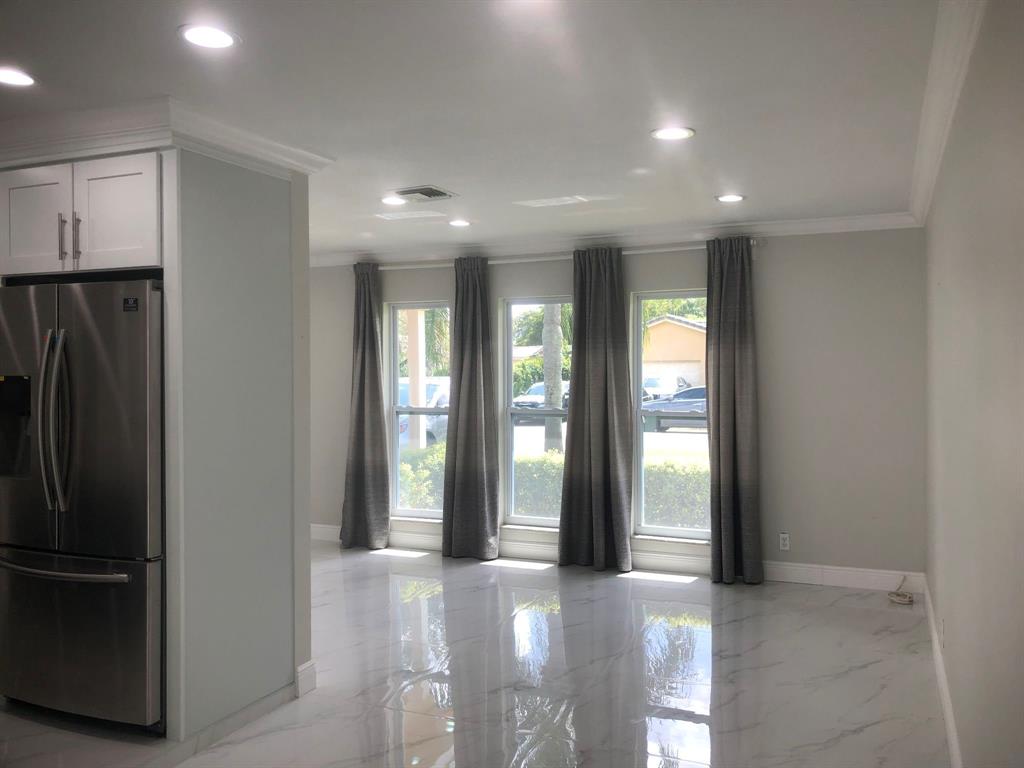 3980 Northwest 109th Avenue Coral Springs, FL 33065 - Photo 3 of 12 a view of entryway with livingroom