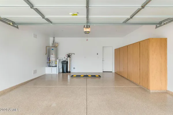 a view of a swimming pool and a yard