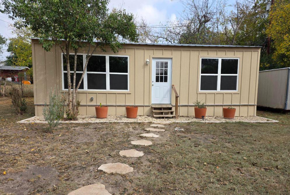 505 East Lane Kerrville, TX 78028 - Photo 1 of 10 a house with trees in the background