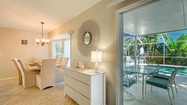 a room with table and chairs