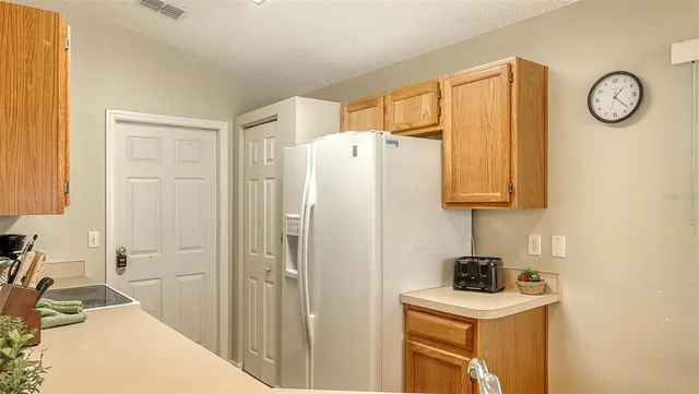 a view of bathroom with a sink mirror and shower
