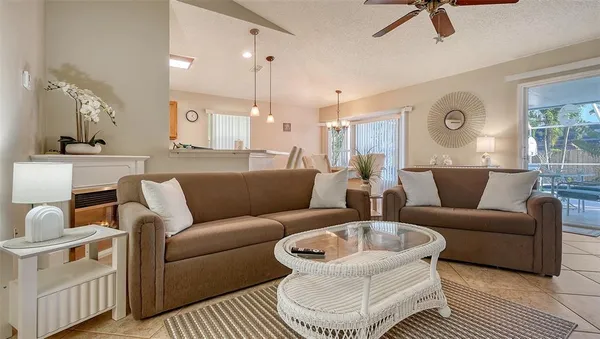 a living room with furniture and a rug