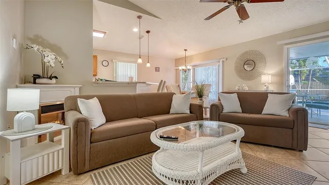 a living room with furniture and a rug