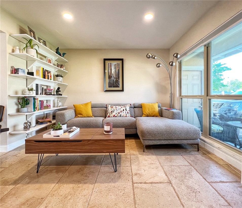 1807 Barbara Street Austin, TX 78757 - Photo 5 of 25 a living room with furniture and a rug