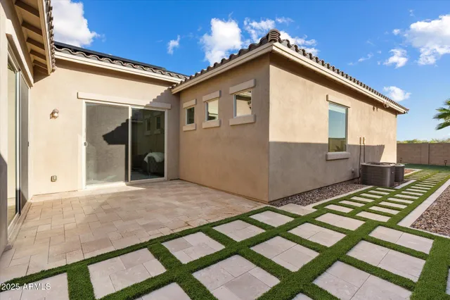 a view of backyard of a house