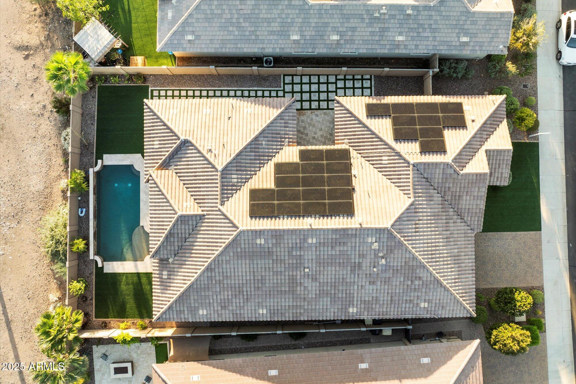 9275 West Plum Road Peoria, AZ 85383 - Photo 38 of 39 an aerial view of a house with a balcony