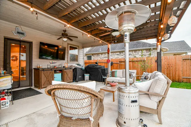 a view of a backyard with swimming pool