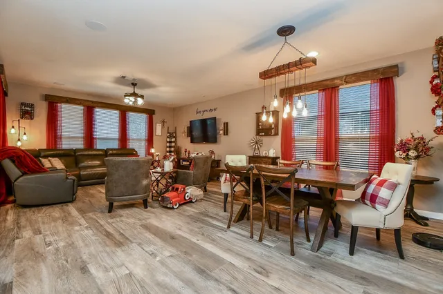 a view of a dining room with furniture window and outside view