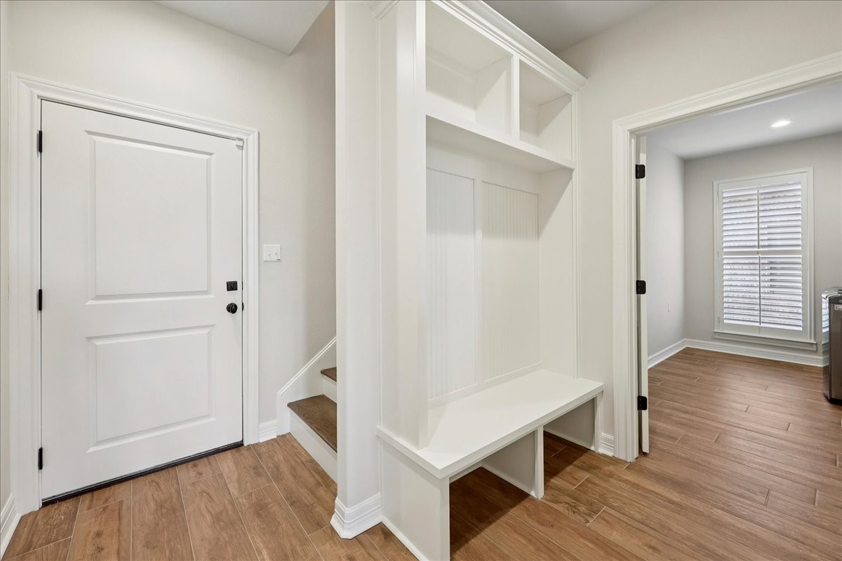 9205 Chicory Street Beaumont, TX 77713 - Photo 35 of 43 a view of an entryway with wooden floor