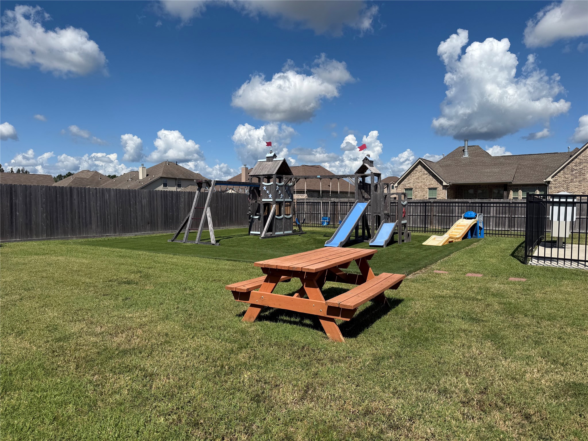 9205 Chicory Street Beaumont, TX 77713 - Photo 43 of 43 a swimming pool covered with lots of trees