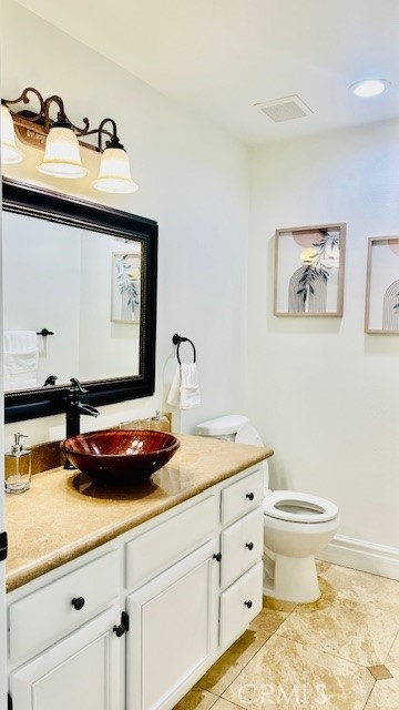 19900 Mariposa Creek Way Porter Ranch, CA 91326 - Photo 15 of 37 a bathroom with a sink and a toilet