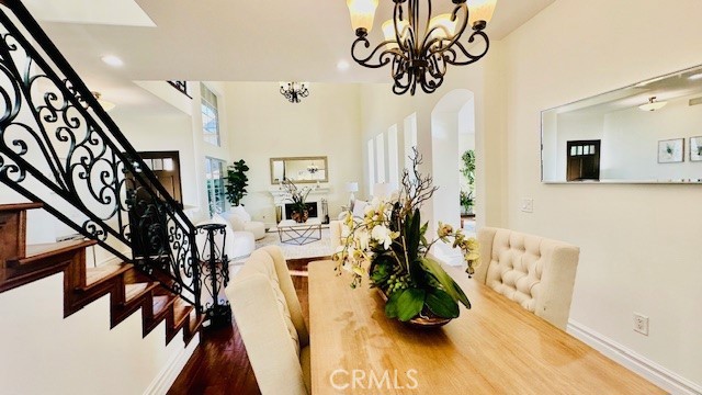 19900 Mariposa Creek Way Porter Ranch, CA 91326 - Photo 17 of 37 a living room with furniture and a potted plant