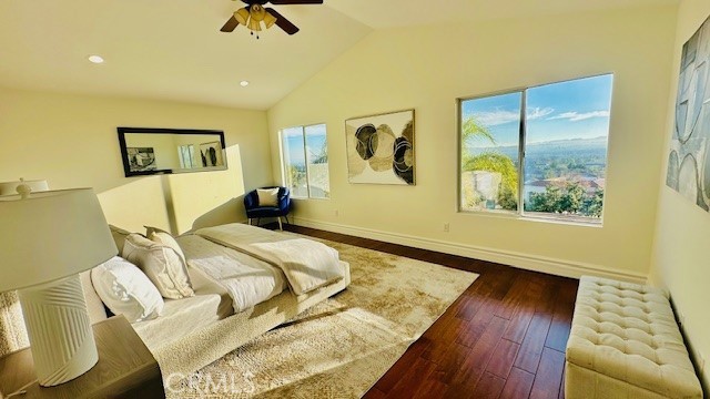 19900 Mariposa Creek Way Porter Ranch, CA 91326 - Photo 22 of 37 a bedroom with a bed and wooden floor