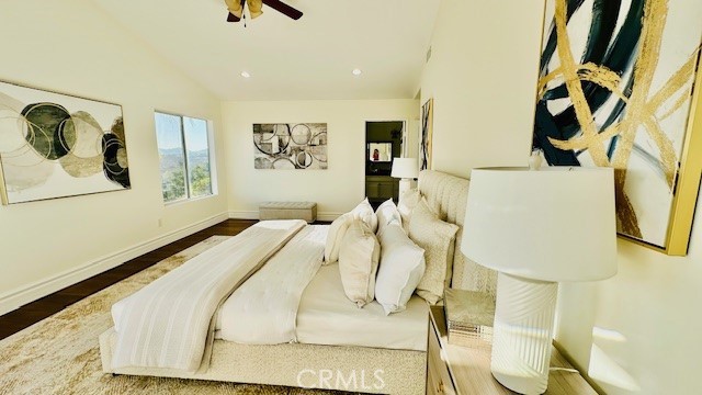 19900 Mariposa Creek Way Porter Ranch, CA 91326 - Photo 24 of 37 a bedroom with a bed and a painting on the wall