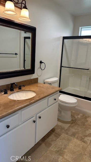 19900 Mariposa Creek Way Porter Ranch, CA 91326 - Photo 27 of 37 a bathroom with a granite countertop sink and a mirror