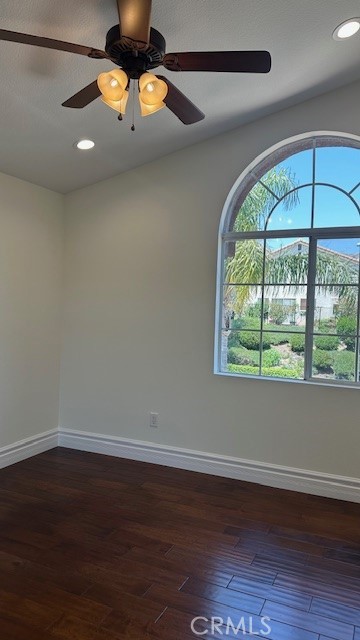 19900 Mariposa Creek Way Porter Ranch, CA 91326 - Photo 28 of 37 an empty room with wooden floor and windows