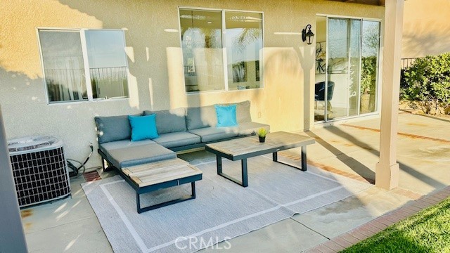 19900 Mariposa Creek Way Porter Ranch, CA 91326 - Photo 31 of 37 a living room with furniture and a table